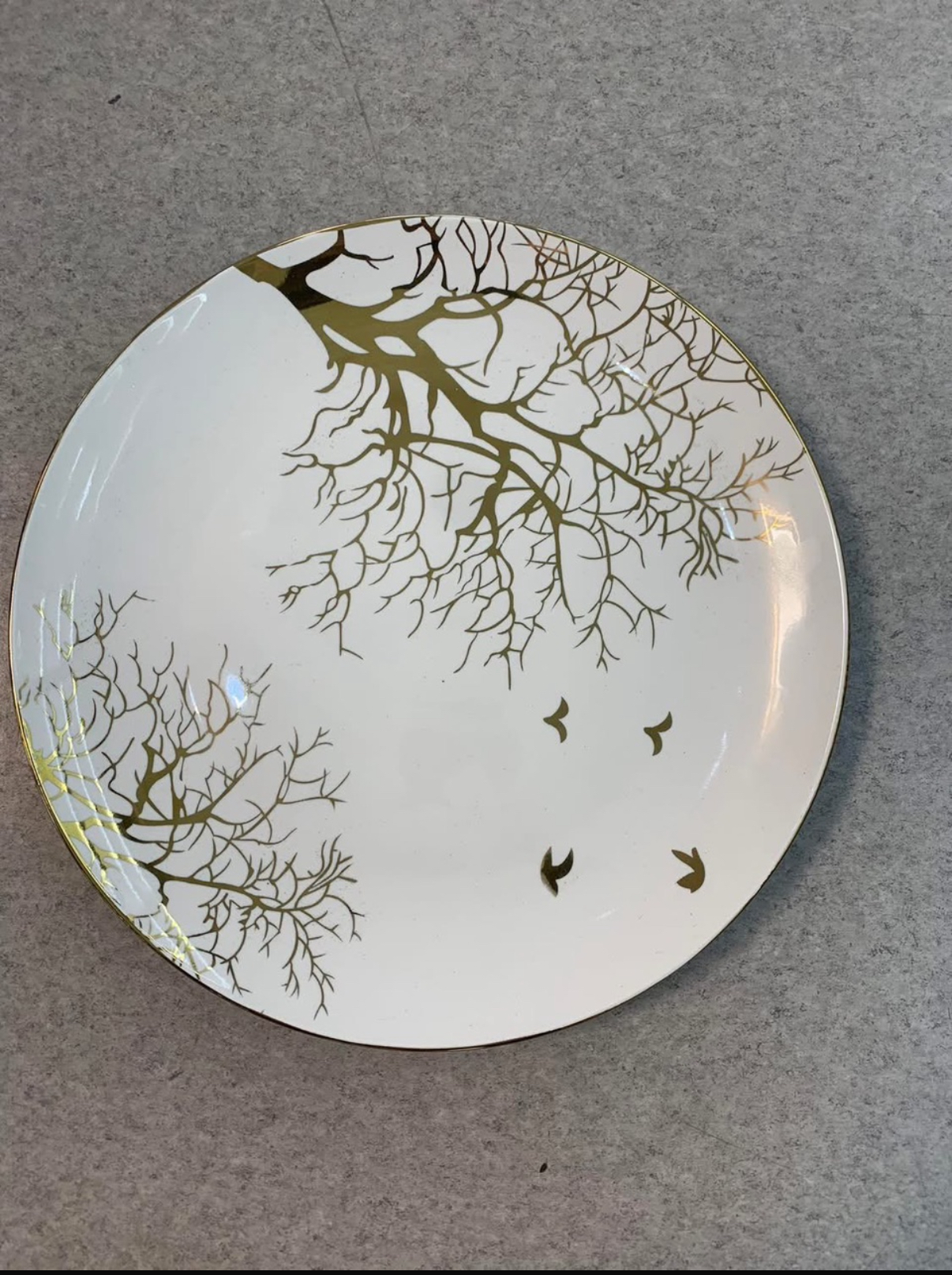 "Elegance to Your Table with Our Nature-Inspired White and Gold Plate."